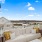 big, terrace with furnishings and water views
